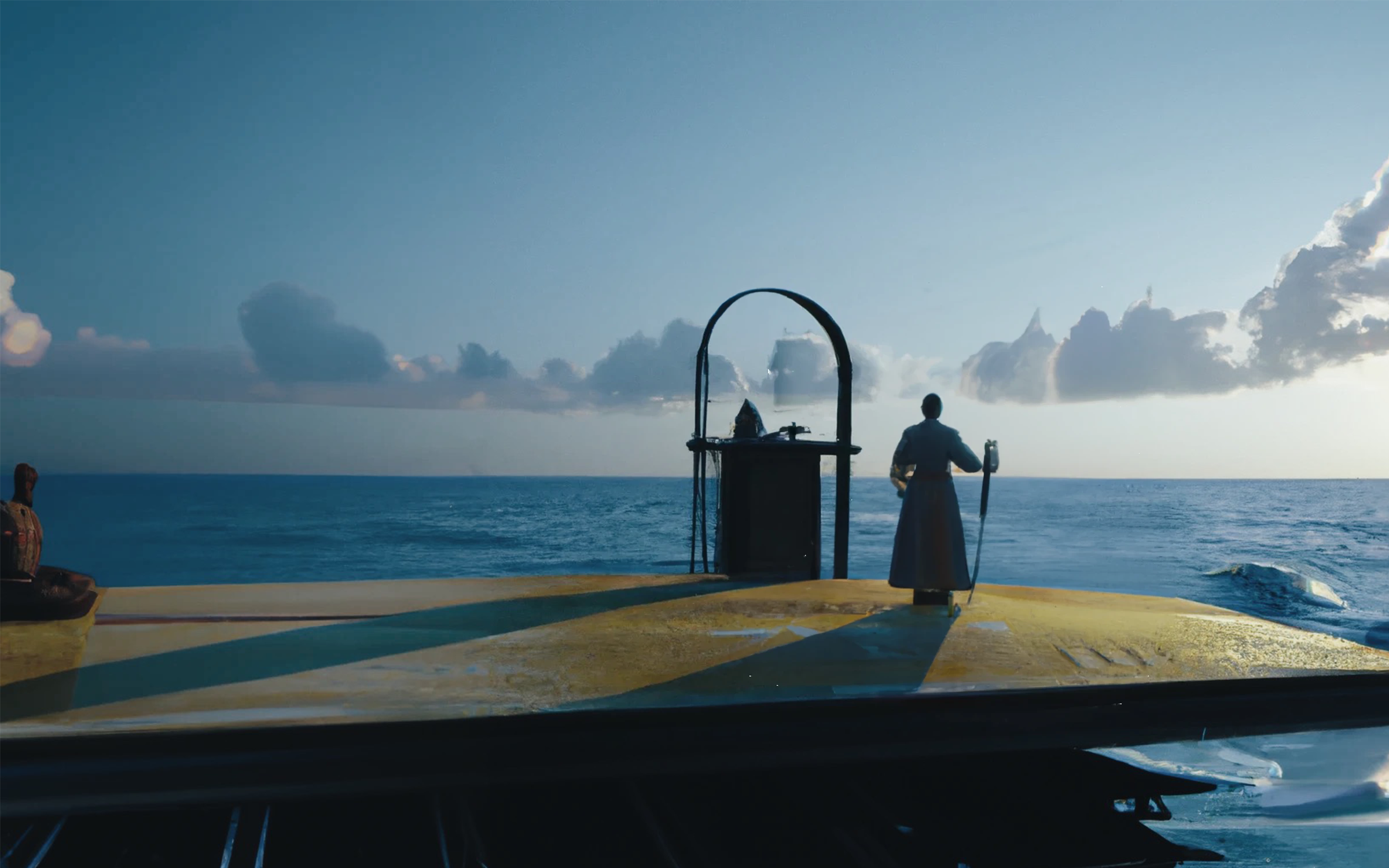 A cultist praying to the ocean from a floating platform / Unknown